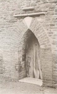 Plate 1 Mid 18th century arched doorway in boundary wall, Cleeve Court (NGR ST 6498 7718).